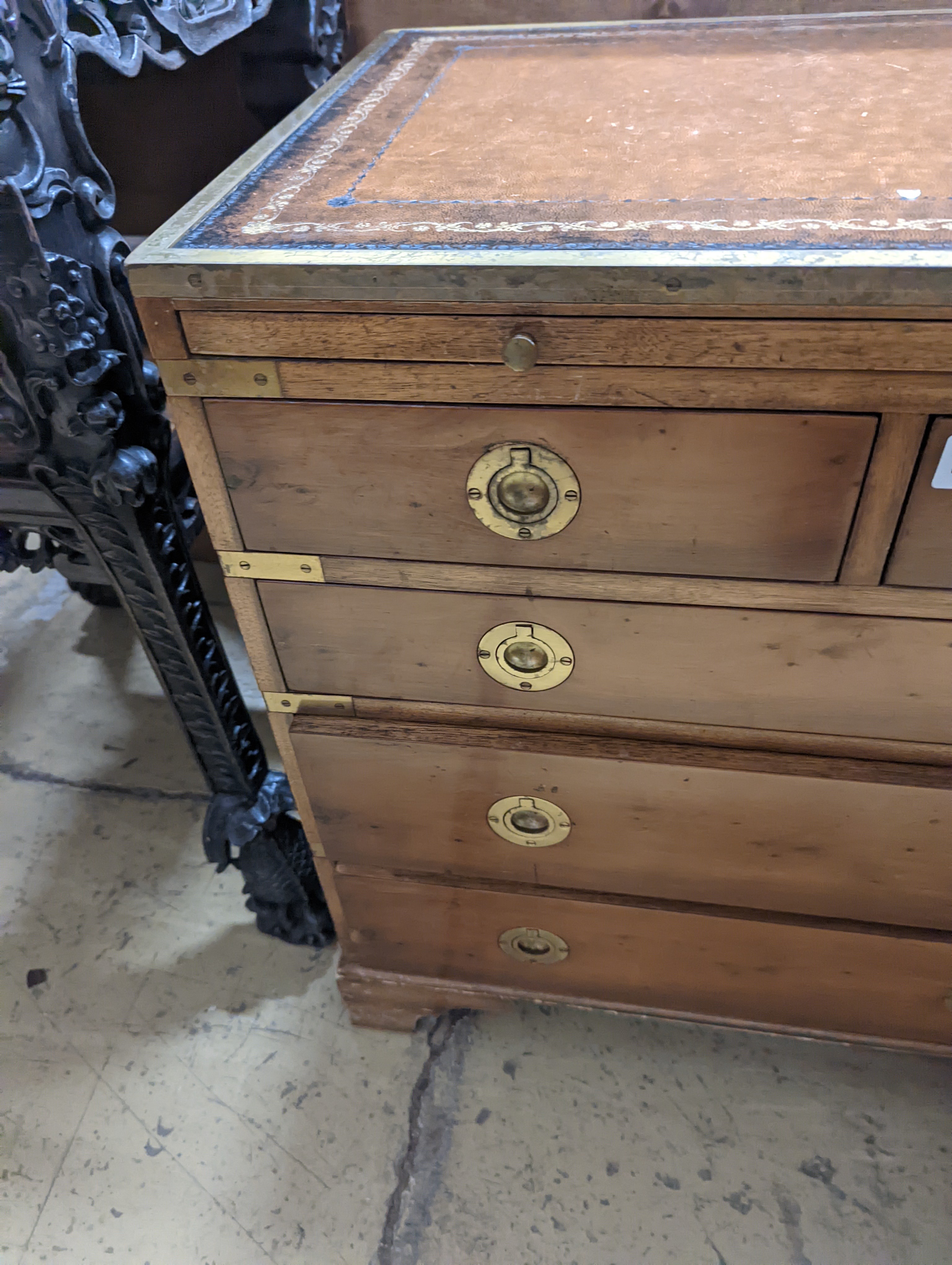A pair of reproduction brass mounted military style yew veneered bedside chests with leather inset tops, width 56cm, depth 40cm, height 60cm